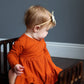 Burnt Orange Twirl Dress